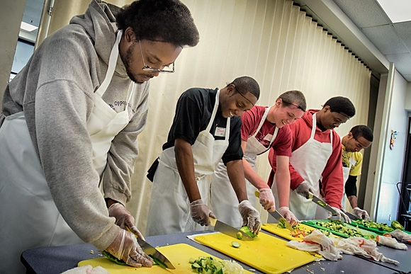 Learning prep skills at the Community Kitchen