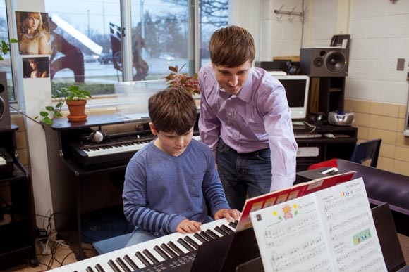 Piano Labs Instructor Hugh Little with Woods Lake Elementary School Student