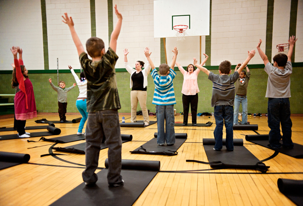 Kids at Prarieview Elementary School participate in morning yoga